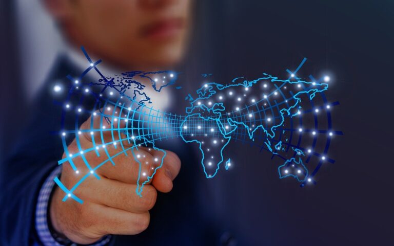 Blog 26 Man pointing international map
